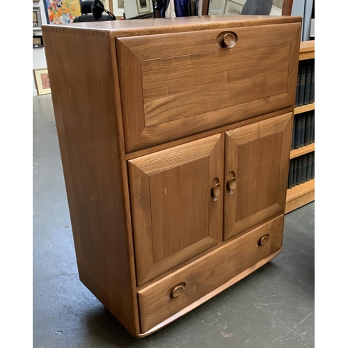 846 - An Ercol drinks cabinet on casters, 72.5x45x110cmH