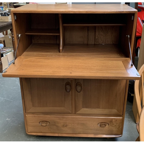 846 - An Ercol drinks cabinet on casters, 72.5x45x110cmH