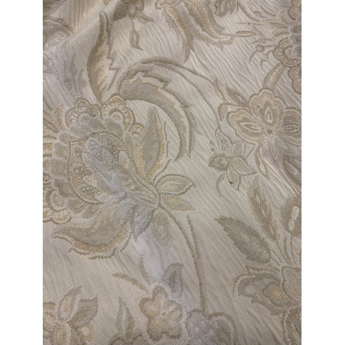 541 - A pair of heavy silk lined cream floral curtains, 215cm drop, ungathered width 366cm