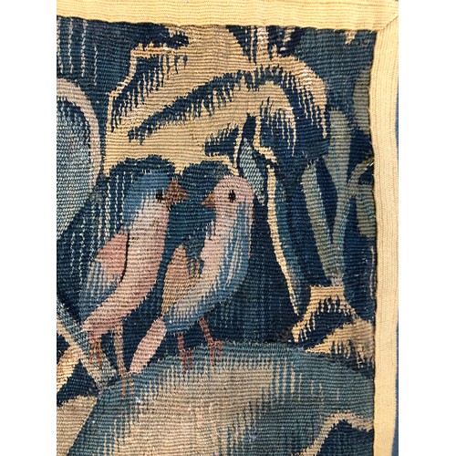 735 - A small piece of verdure tapestry, with two songbirds, 60x89cm

Provenance: part of the contents of ... 