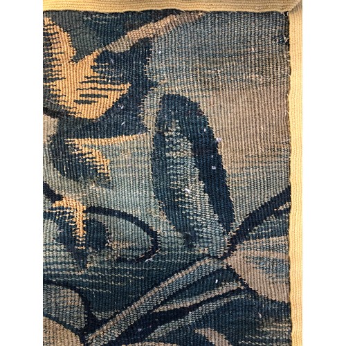 735 - A small piece of verdure tapestry, with two songbirds, 60x89cm

Provenance: part of the contents of ... 