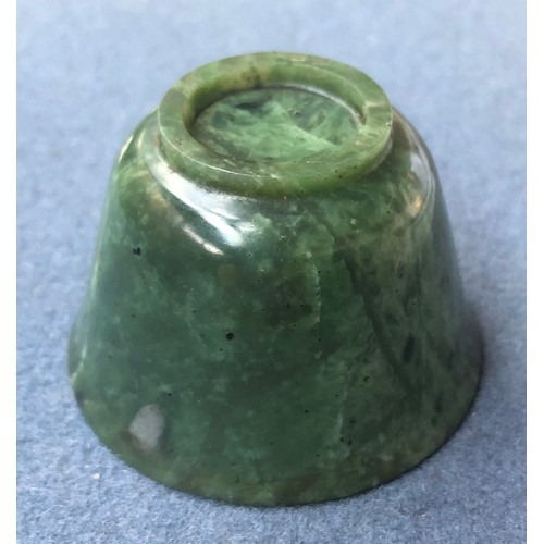 176 - A Chinese spinach jade cup, of flaring form with short form foot, approx. 6cm diameter, 4cm high