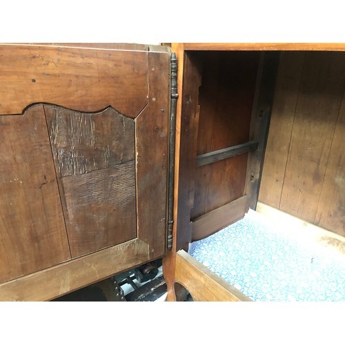 560 - A very large French walnut sideboard in 18th century style, having four drawers over four cupboard d... 