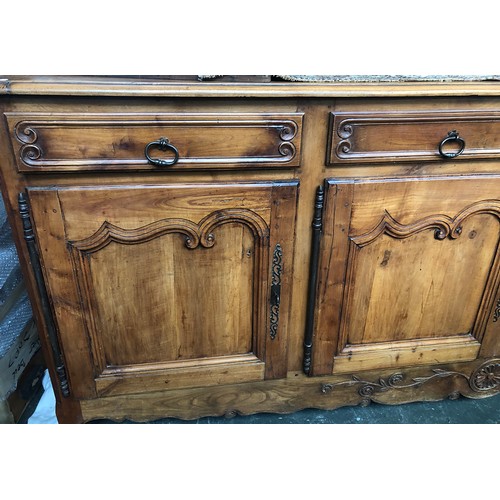 560 - A very large French walnut sideboard in 18th century style, having four drawers over four cupboard d... 