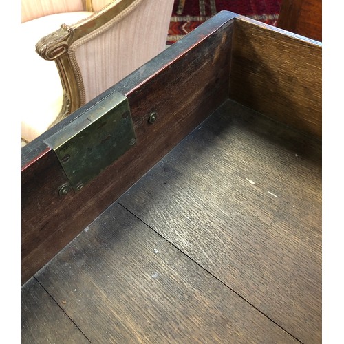 574 - A George III mahogany bachelors chest, crossbanded moulded top over a slide, with two short over thr... 