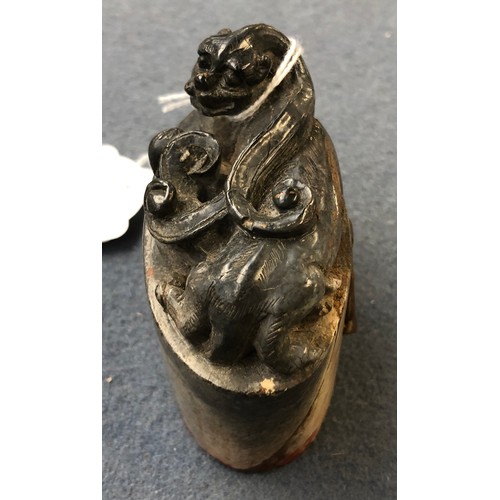 183 - A Chinese carved soapstone seal in the form of a foo dog, the seal reading 'Zijin Shan' (Purple Moun... 