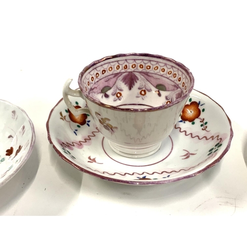 100 - A Sunderland ware pink lustre teacup and saucer, together with one other similar and two 19th centur... 