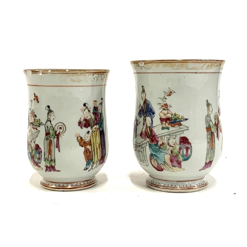 125 - Two Chinese export mugs of baluster form (af), each painted in polychrome enamels and heightened in ... 