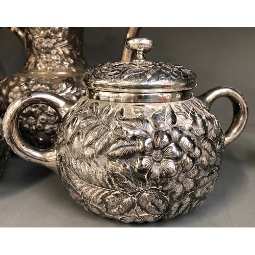 61 - A Whiting Manufacturing Co four piece American sterling silver tea set, comprising teapot on stand w... 