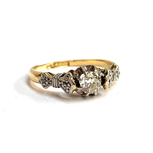 1 - An Art Deco 18ct gold and platinum diamond solitaire ring, the central claw set diamond approx. 0.25... 