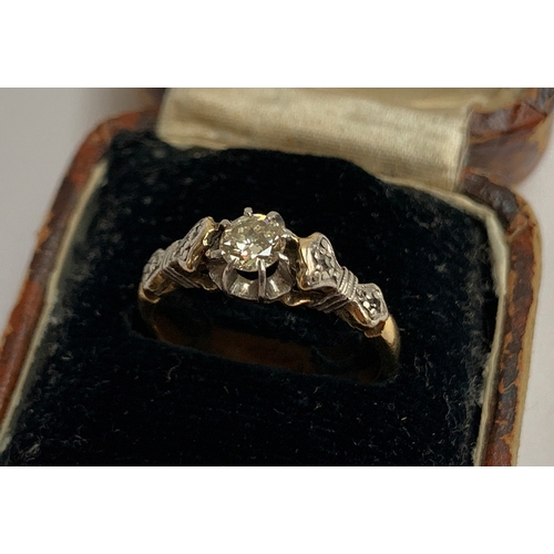 1 - An Art Deco 18ct gold and platinum diamond solitaire ring, the central claw set diamond approx. 0.25... 