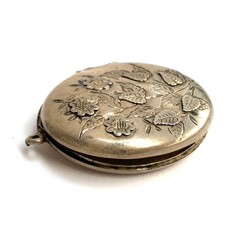 12 - A silver locket with engraved floral decoration (af), silver aesthetic movement brooch, 3cmD; yellow... 