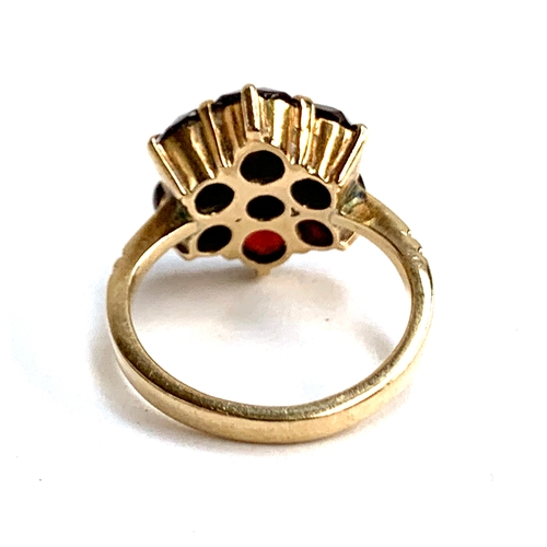 14 - An early 20th century 9ct gold floral garnet cluster ring, size I 1/2, approx. 4g