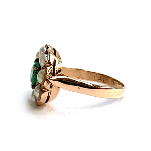 15 - A 14ct gold cluster ring set with a central emerald surrounded by a halo of pearls, size N, approx. ... 