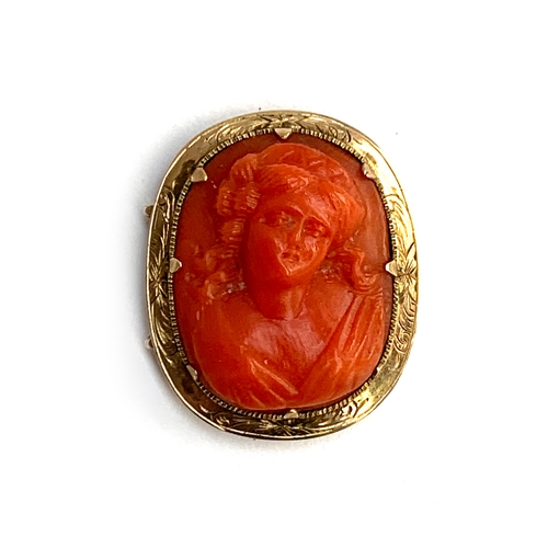 A Victorian yellow metal mounted coral cameo necklace clasp of a woman (clasp tongue absent), approx. 5g, 2.5cmL