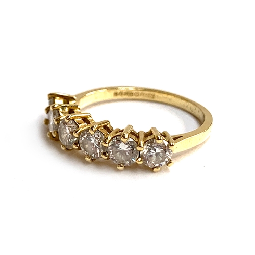 2 - An 18ct gold and diamond six stone half eternity ring, total carat weight of the six brilliant cut d... 