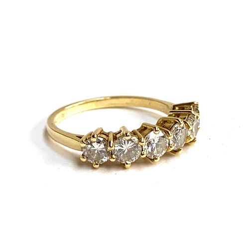 2 - An 18ct gold and diamond six stone half eternity ring, total carat weight of the six brilliant cut d... 