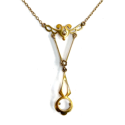 6 - An Edwardian Art Nouveau style 9ct gold necklace, the lavalier pendant set with seed pearls (one sto... 