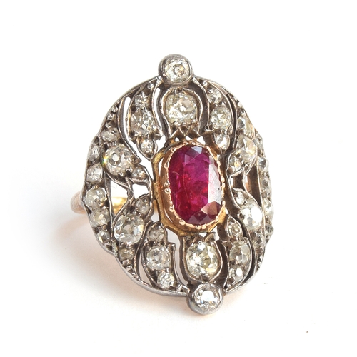 14 - A Victorian 18ct gold and silver openwork ring, 38 old cut diamonds surrounding a central ruby, appr... 