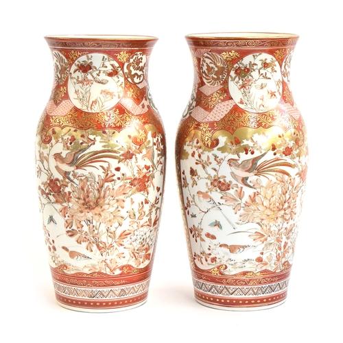 120 - A pair of Japanese Meiji era vases, decorated with panels of court scenes and sparrows amongst folia... 