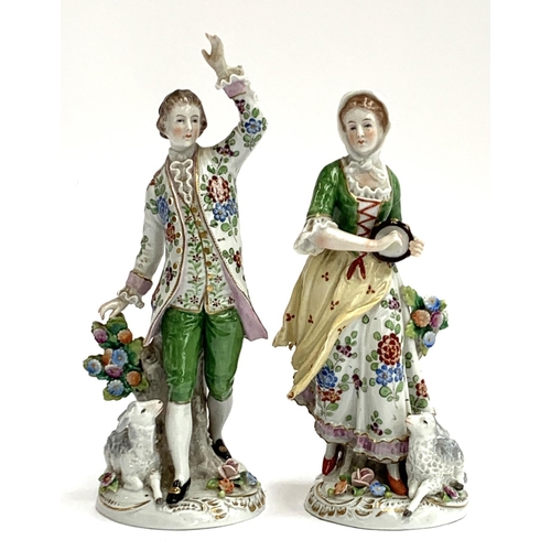 60 - A pair of Sitzendorf figures, a lady and gentleman, each with lamb, 20cm and 22cmH