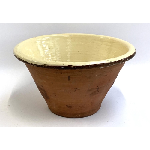 80 - A 19th century terracotta glazed dairy bowl, 38.5cmD, 25cmH