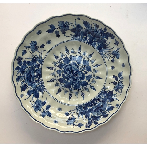 109 - A blue and white Delft charger, c.1961, 28cm diameter, marks to base