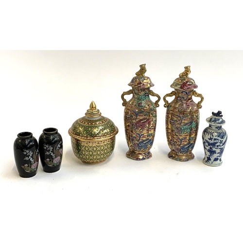 97 - A pair of Chinese transfer ware and hand painted lidded vases with, heightened in gilt, marks to bas... 