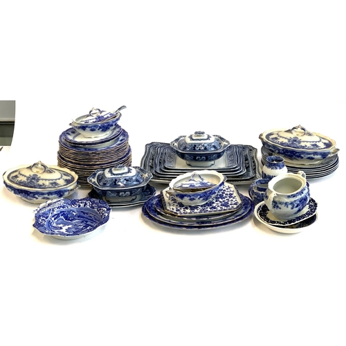 99 - A quantity of blue and white dinner ware to include Burslem, Copeland Spode, Willow, etc