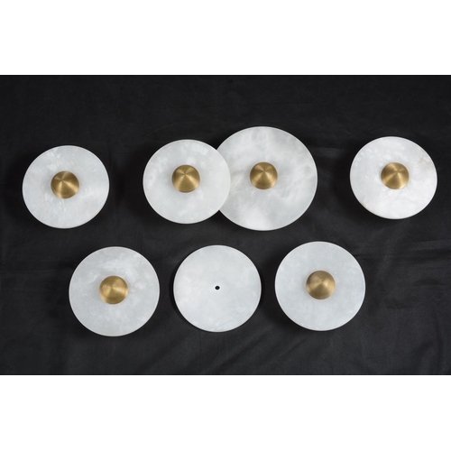 853 - A group of five modern marble and metal wall lamps in art deco style, the double disk example 58cm w... 