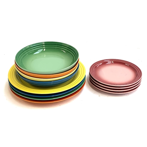 123 - A quantity of Le Creuset dinner plates, 27cmD, pasta bowls, 21cmD, and side plates, 8.5cmD (12 piece... 