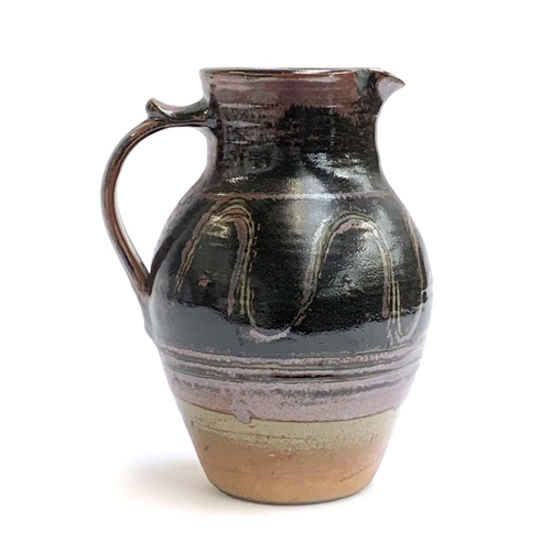 130 - A Winchcombe studio pottery jug, by Alex McErlain, 27cmH