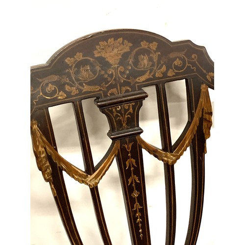 857 - An Edwardian marquetry shield back occasional chair