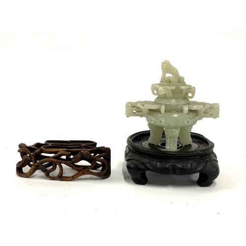 147 - A Chinese soapstone censer (af); together with two carved hardwood stands, one with pierced design