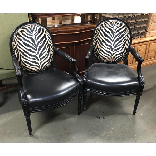 832 - A set of ten contemporary black painted open armchairs, with zebra upholstered backs and black and v... 