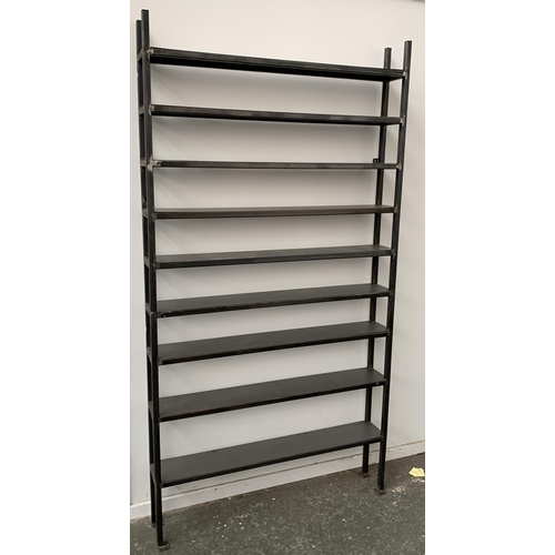 841 - A set of industrial style fabricated steel shelves, formed in two stacking sections, comprising nine... 