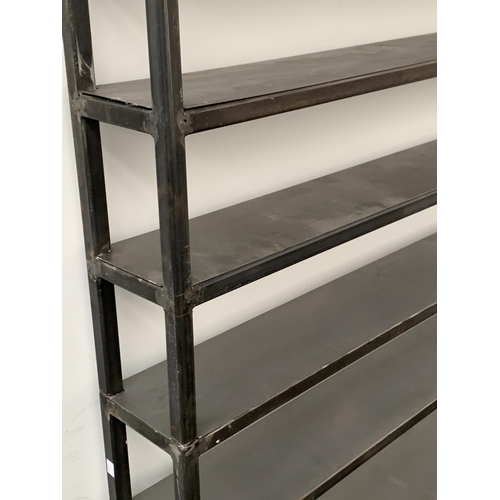 841 - A set of industrial style fabricated steel shelves, formed in two stacking sections, comprising nine... 