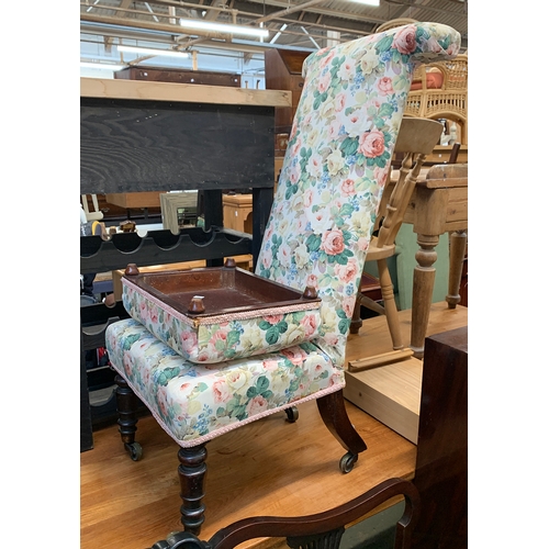 825 - A floral upholstered Prie Dieu chair with casters and a matching footstool