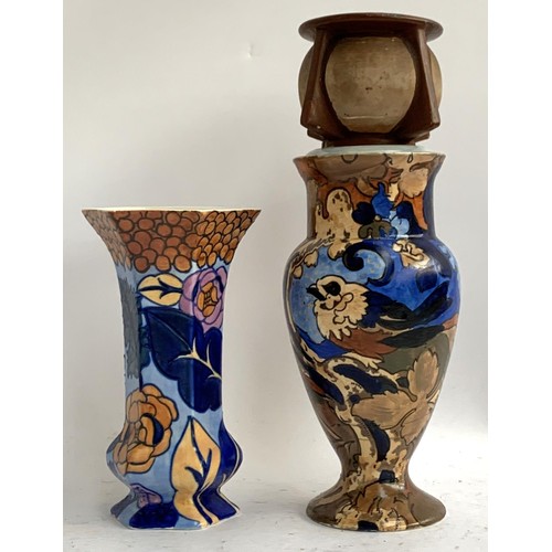 130A - A Charlotte Rhead Bursley ware hexagonal vase with tube lined floral peony design, 20cmH, together w... 