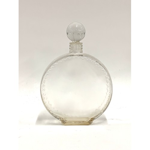 87A - A 20th century Lalique glass scent bottle, of circular form, the neck relief moulded reading 'NR', t... 