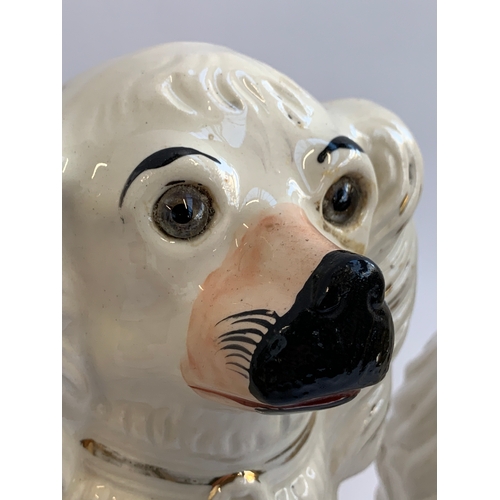 52 - A pair of large Staffordshire dogs with glass eyes, approx. 39cmH