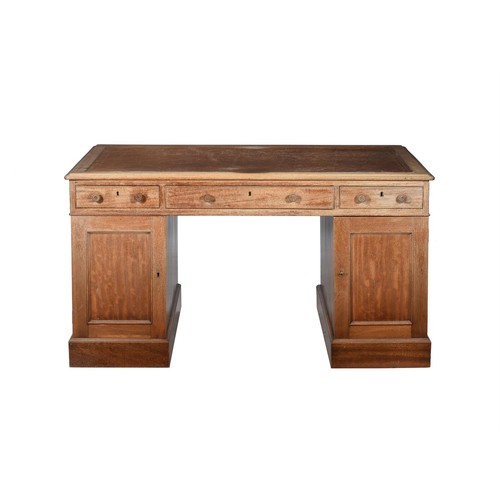 576 - A Victorian mahogany pedestal partner's desk, c.1880, with leather inset top above the three frieze ... 