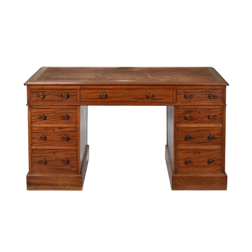 576 - A Victorian mahogany pedestal partner's desk, c.1880, with leather inset top above the three frieze ... 