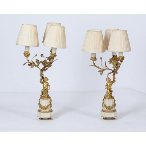 378 - A pair of French Ormolu and white marble three-light candelabras, in Louis XVI style, late 19th cent... 