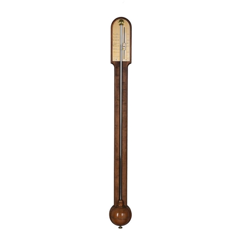 438 - A George III mahogany stick barometer, by Worthington, London, c.1810, with arched caddy-moulded upp... 