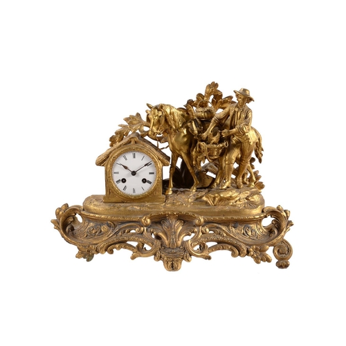 431 - A late 19th century French gilt metal mantel clock, case with figural decoration of boy with horse, ... 