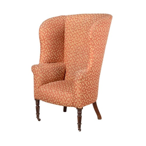 606 - A mahogany and upholstered barrel back armchair, c.1830, with turned supports to the front, 82cm wid... 