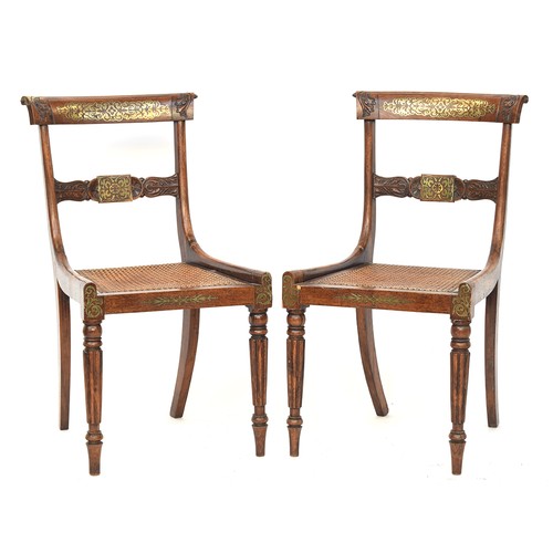 593 - A pair of Regency beech and brass inlaid dining chairs, with cane seats