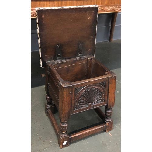 865 - A vinyl topped carved oak stool