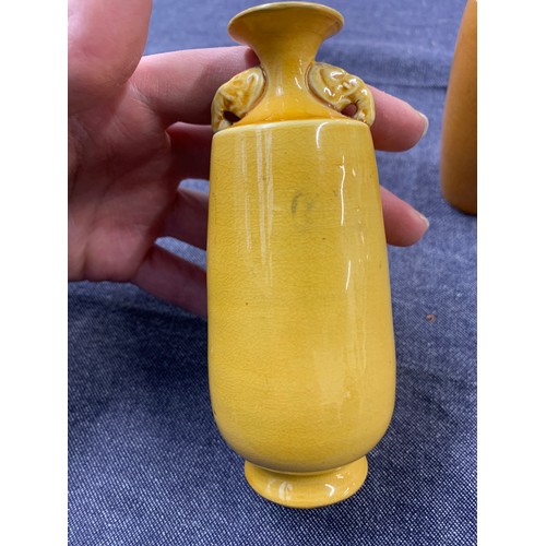 96 - Two small yellow glaze Chinese vases with elephant handles, approx 12cmH, together with a small gree... 